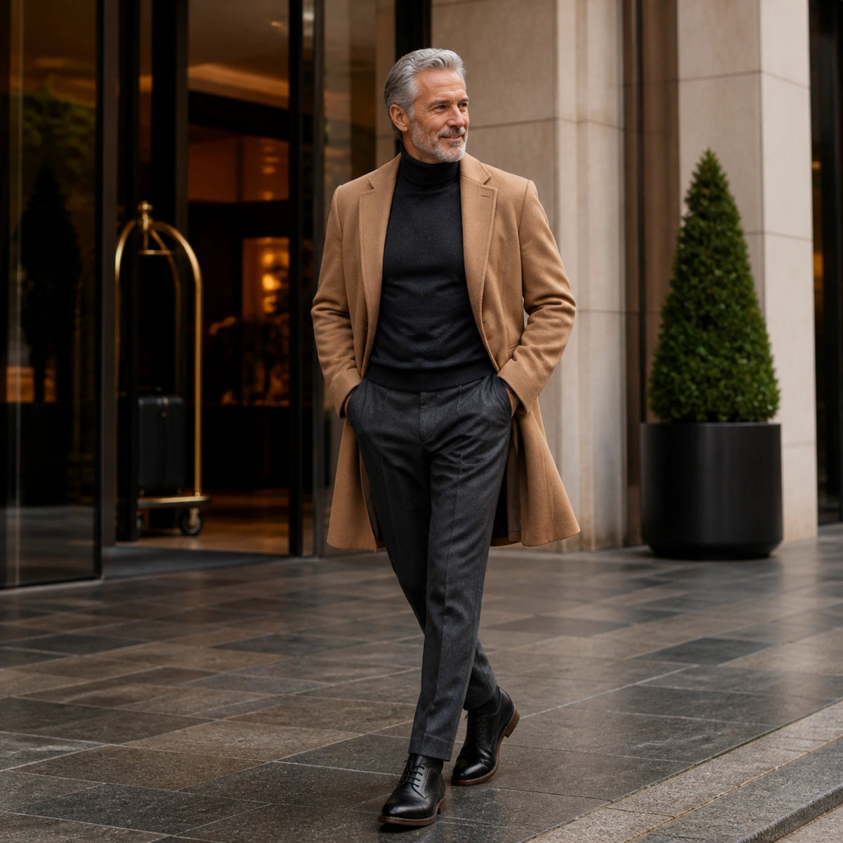 Mature man wearing black full grain ankle boots outside a hotel — view 7