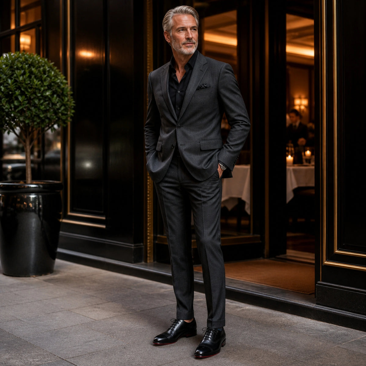 Mature man wearing black Oxford shoes outside an upscale restaurant — view 7