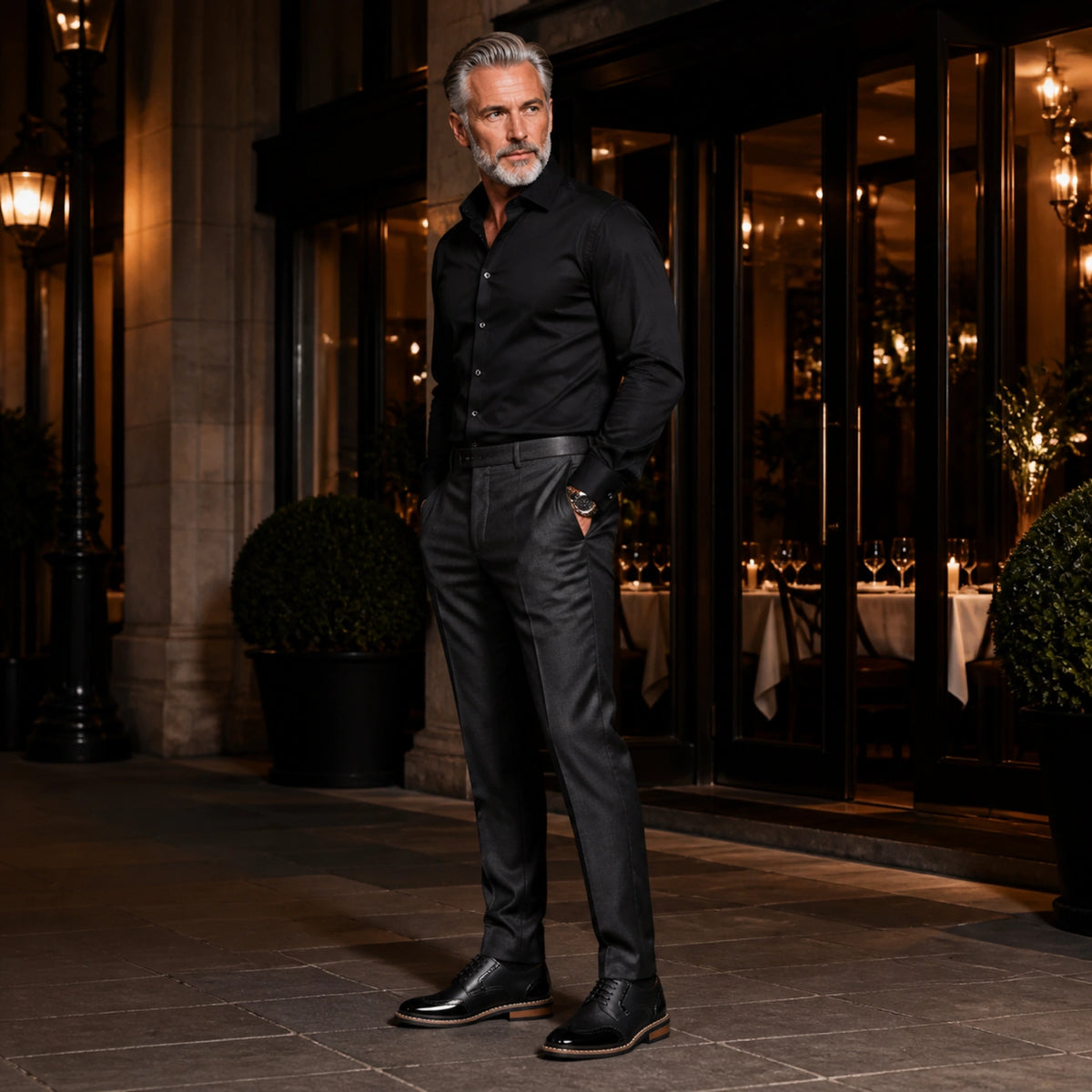 Mature man wearing black wingtip Oxford shoes outside an upscale restaurant — view 8