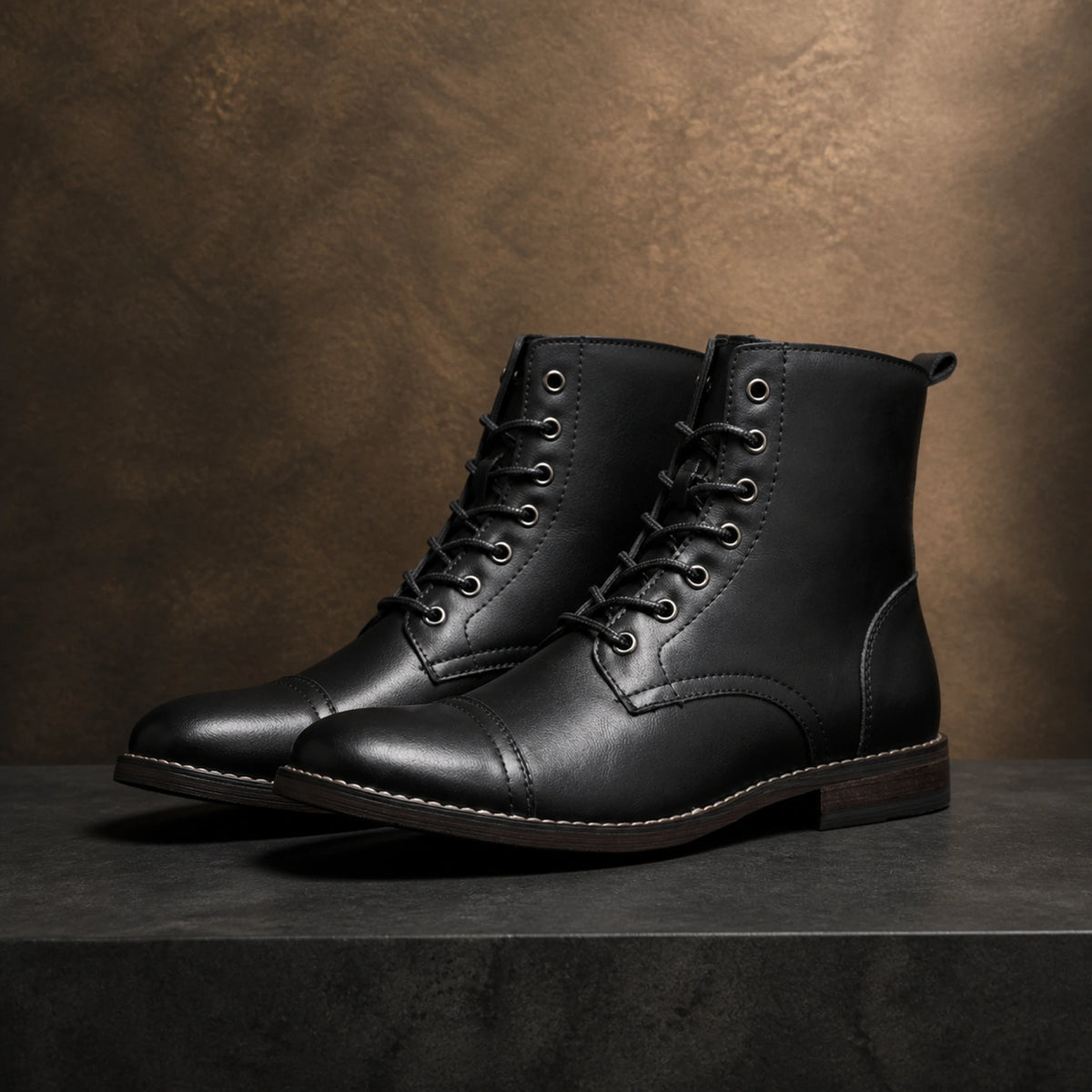 ankle boots — Black cap toe lace up boots complete pair front view — view 3