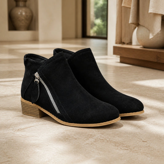 Black suede low heel diagonal zip ankle boots complete pair front view — view 2