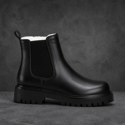 ankle boots — Black fleece lined chunky Chelsea boot true side profile — view 2