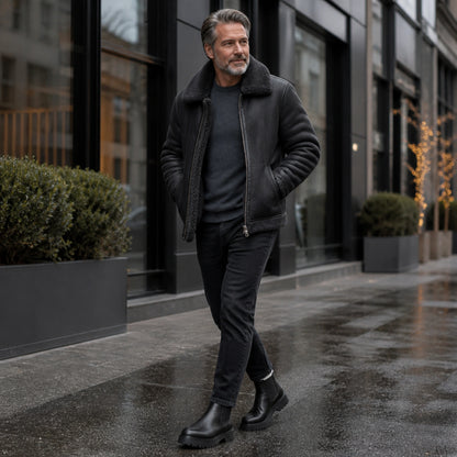 ankle boots — Mature man wearing black chunky Chelsea boots on a city street — view 5