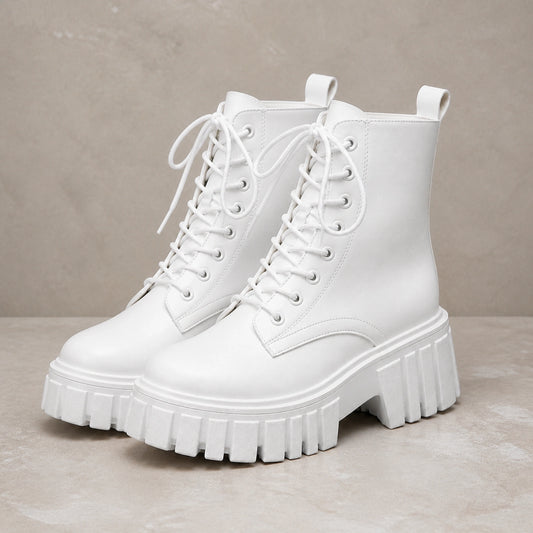 White chunky platform combat ankle boots complete pair front view — view 2