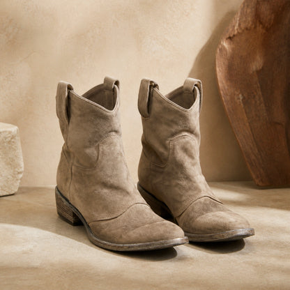 Taupe ruched suede Western ankle boots complete pair front view