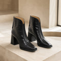 Black square toe leather high block heel ankle boots complete pair front view
