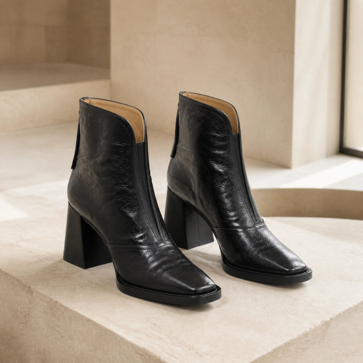 Black square toe leather high block heel ankle boots complete pair front view