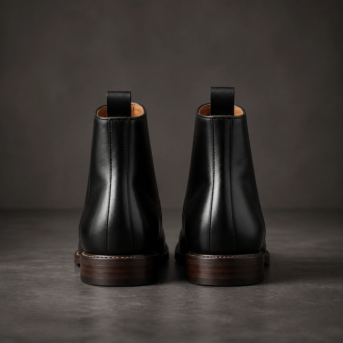 Black full grain ankle boots direct rear view — view 4