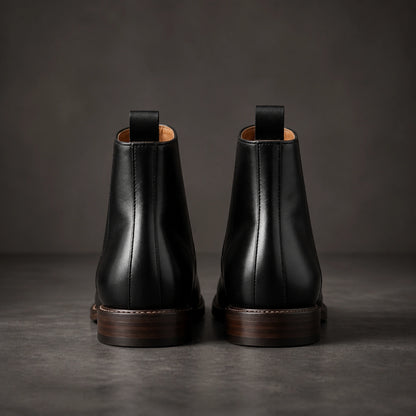 Black full grain ankle boots direct rear view — view 4
