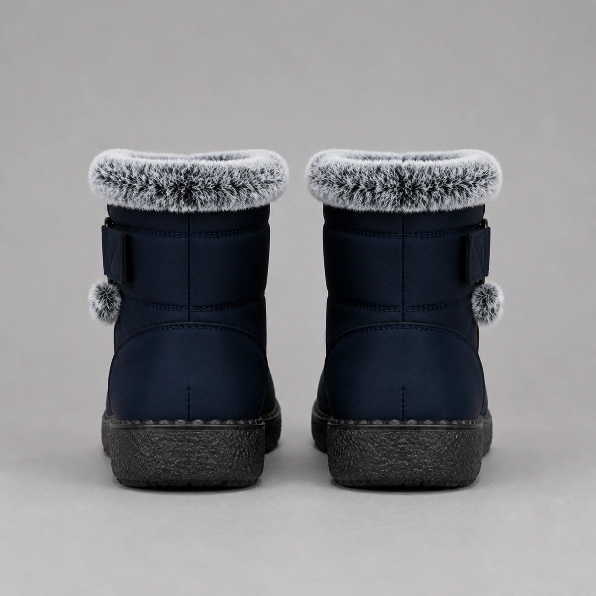 Navy padded faux fur winter ankle boots direct rear view — view 4