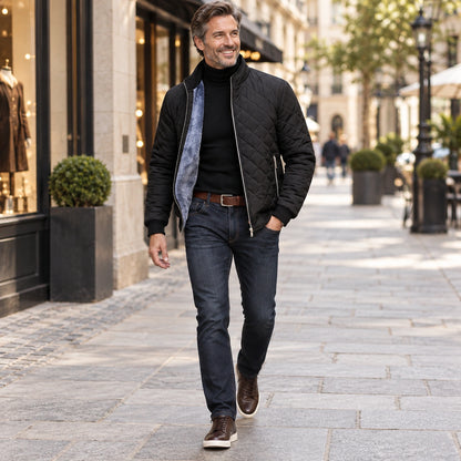 Happy adult model wearing the full Black Asher Diamond Quilted Zip Pocket Jacket in a cool UK autumn setting — view 5