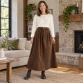 corduroy skirt — Hazel brown front — full garment on smiling adult model