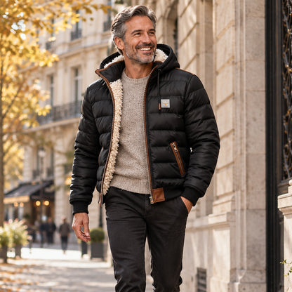 Jacket focused front view of the full Black Daniel Sherpa Lined Quilted worn by a happy adult model in UK autumn street