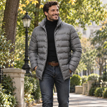 Jacket focused front view of the full Grey Finn Quilted High Collar Puffer worn by a happy adult model in UK autumn street