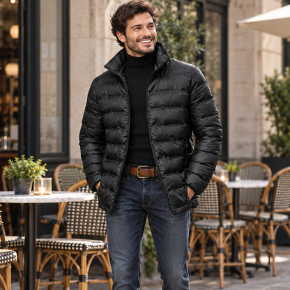 Jacket focused front view of the full Black Finn Quilted High Collar Puffer worn by a happy adult model in UK autumn — view 3