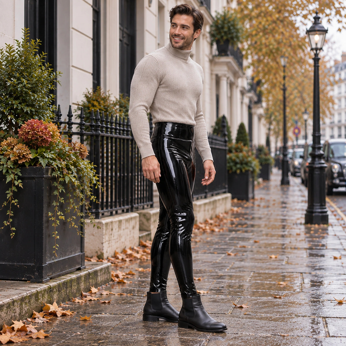 leather trousers — Side full length view of the Black garment worn by a happy adult model in cool UK autumn setting — view 5