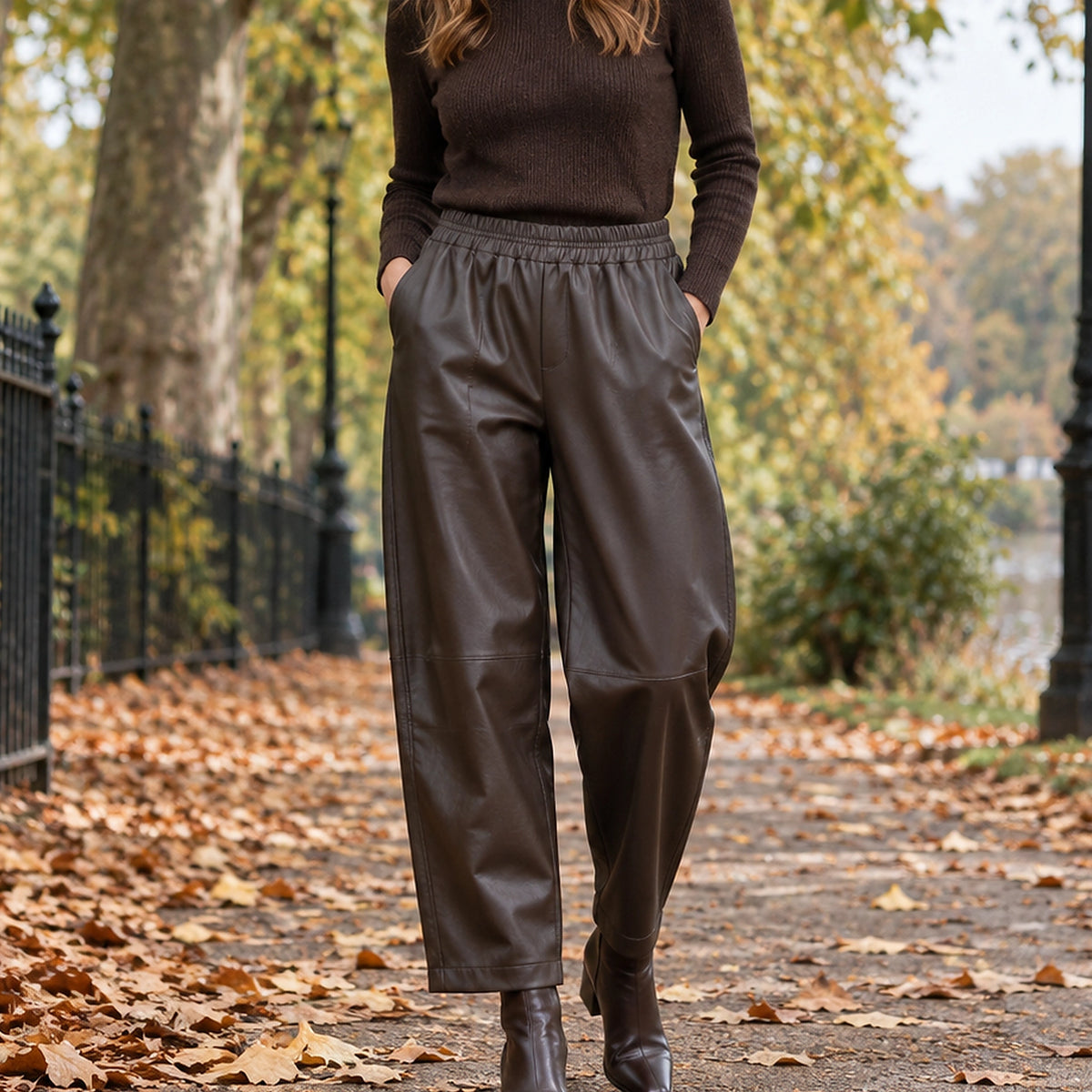 leather trousers — Front view of the full Brown trousers worn by an adult model in a cool UK autumn street setting — view 2