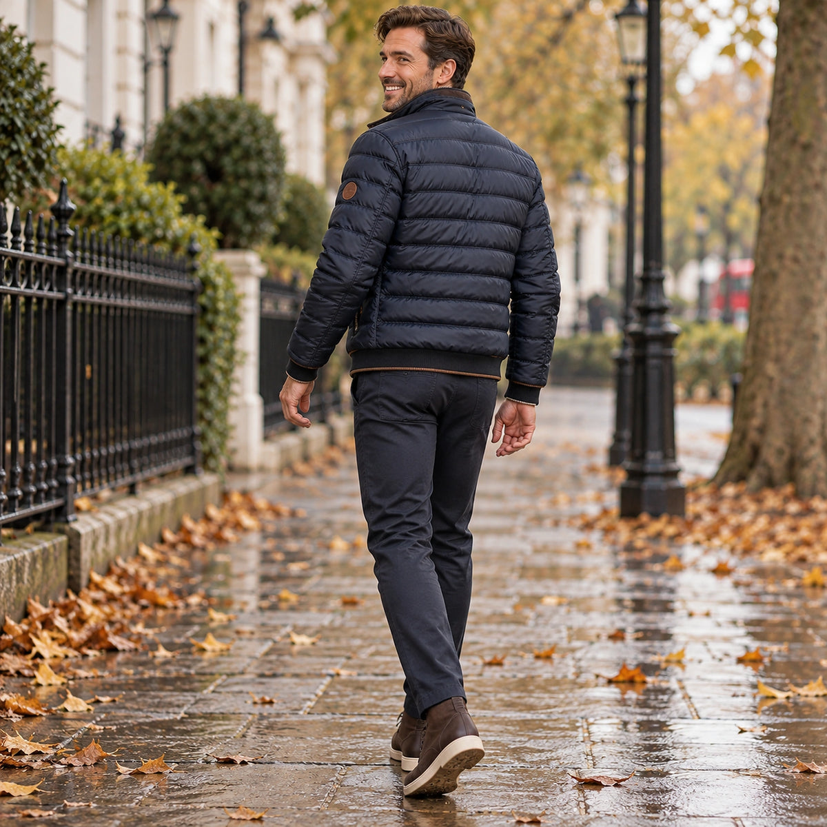 Back full length view of the Navy Blue garment worn by a happy adult model in cool UK autumn setting — view 4