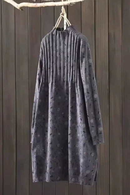 Grey knit midi jumper dress hanging against wooden background, showcasing ribbed texture and subtle pattern — view — view 10