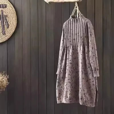 A Line knit midi jumper dress with long sleeves and subtle pattern, hanging on wooden wall — view 10 — view 14
