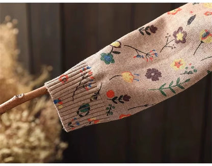 Midi jumper dress — Floral patterned sleeve of a knit showcasing colourful flower designs — view 18 — view 22