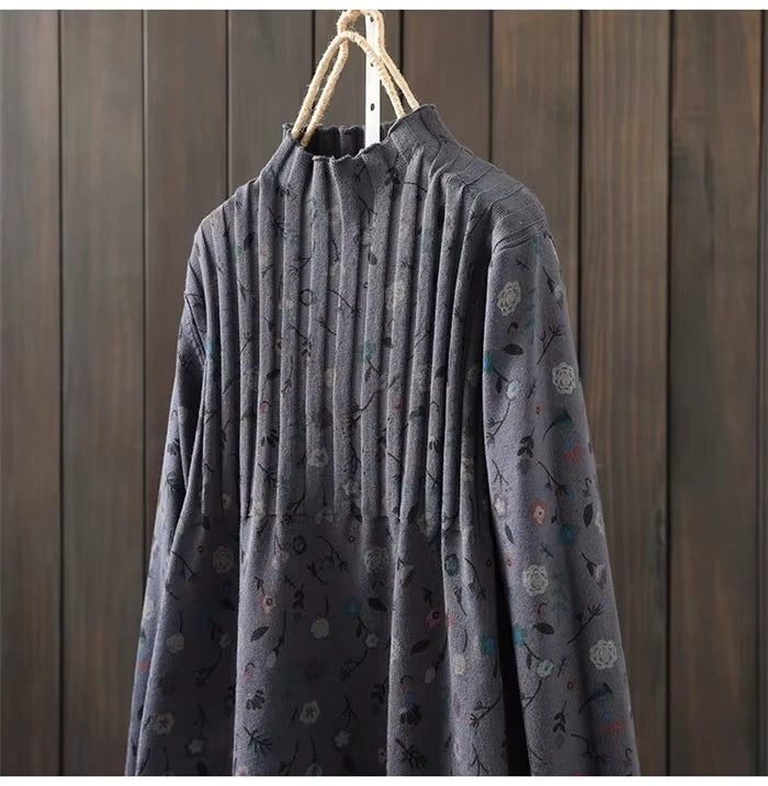A Line knit midi jumper dress with pleated detail and floral pattern, hanging on wooden hanger — view 24 — view 28