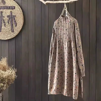 A Line knit midi jumper dress with floral pattern, hanging on wooden hanger — view 5