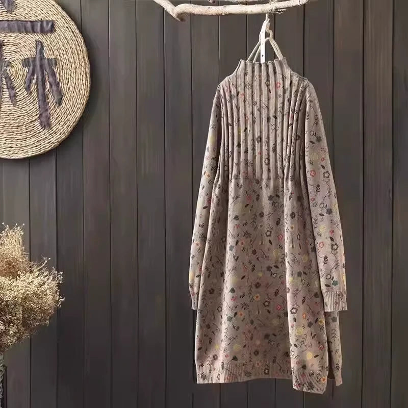 A Line knit mid calf midi jumper dress with floral pattern, hanging on wooden hanger — view 3 — view 7