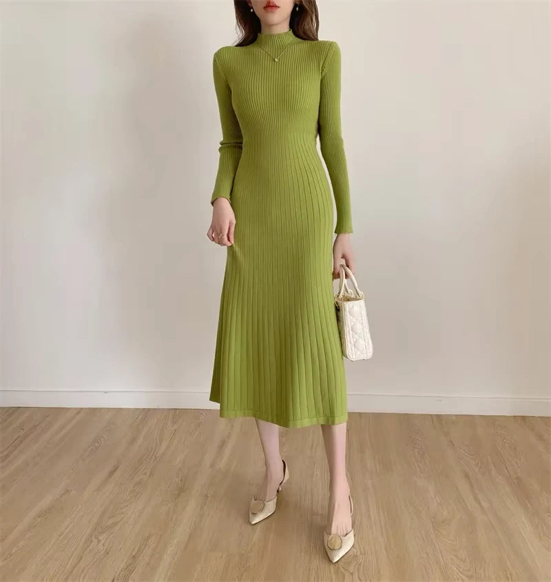 Green A line knitted half high collar midi jumper dress, long sleeves, wooden floor background — view 18 — view 21
