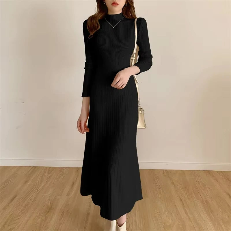 Black knitted midi jumper dress with half high collar and long sleeves, front view — 29 — view 32