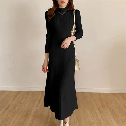 Black knitted midi jumper dress with half high collar and long sleeves, front view — 29 — view 32