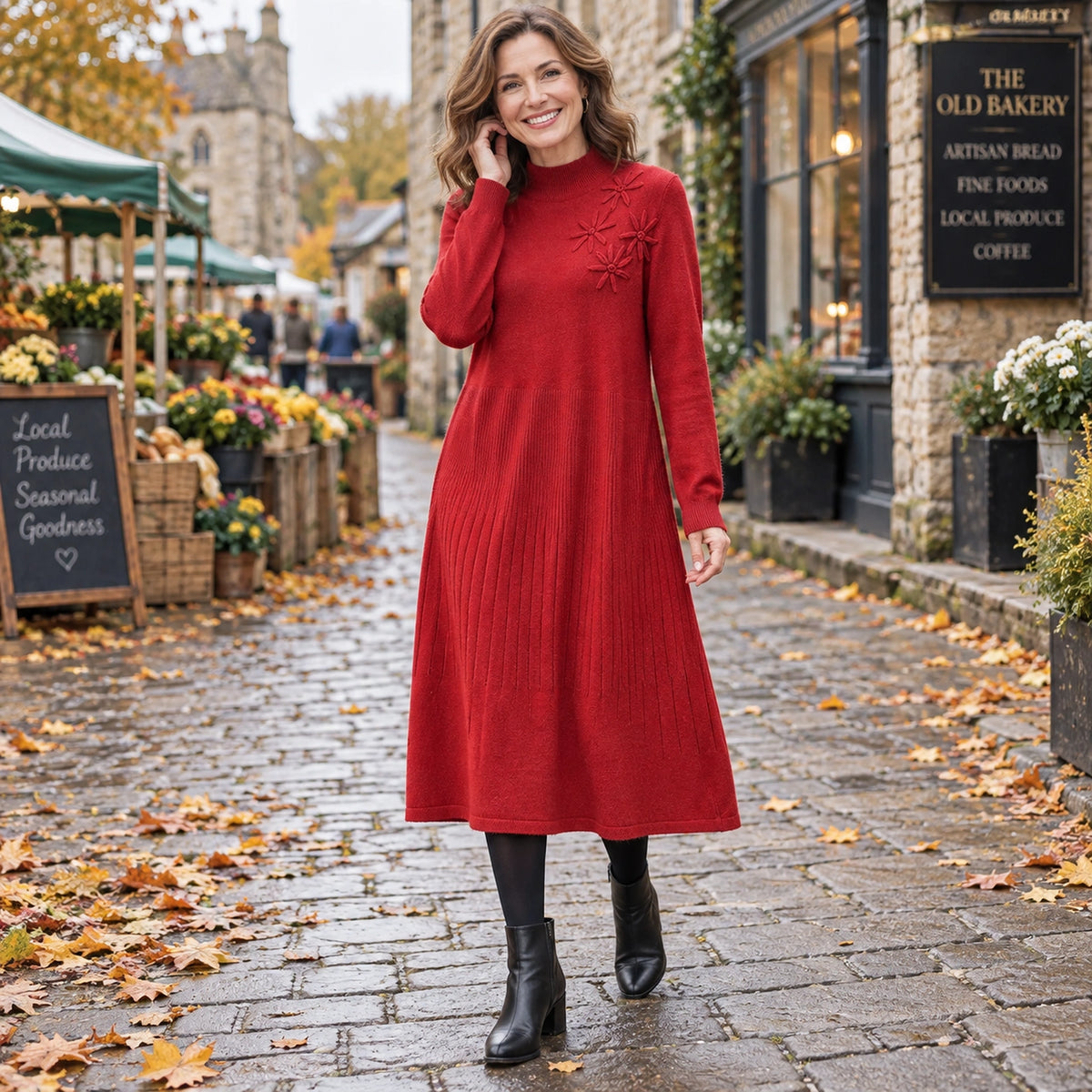 Women's Embroidered Turtleneck Wool Blend Midi Jumper Dress in Red, worn by a happy model UK autumn setting