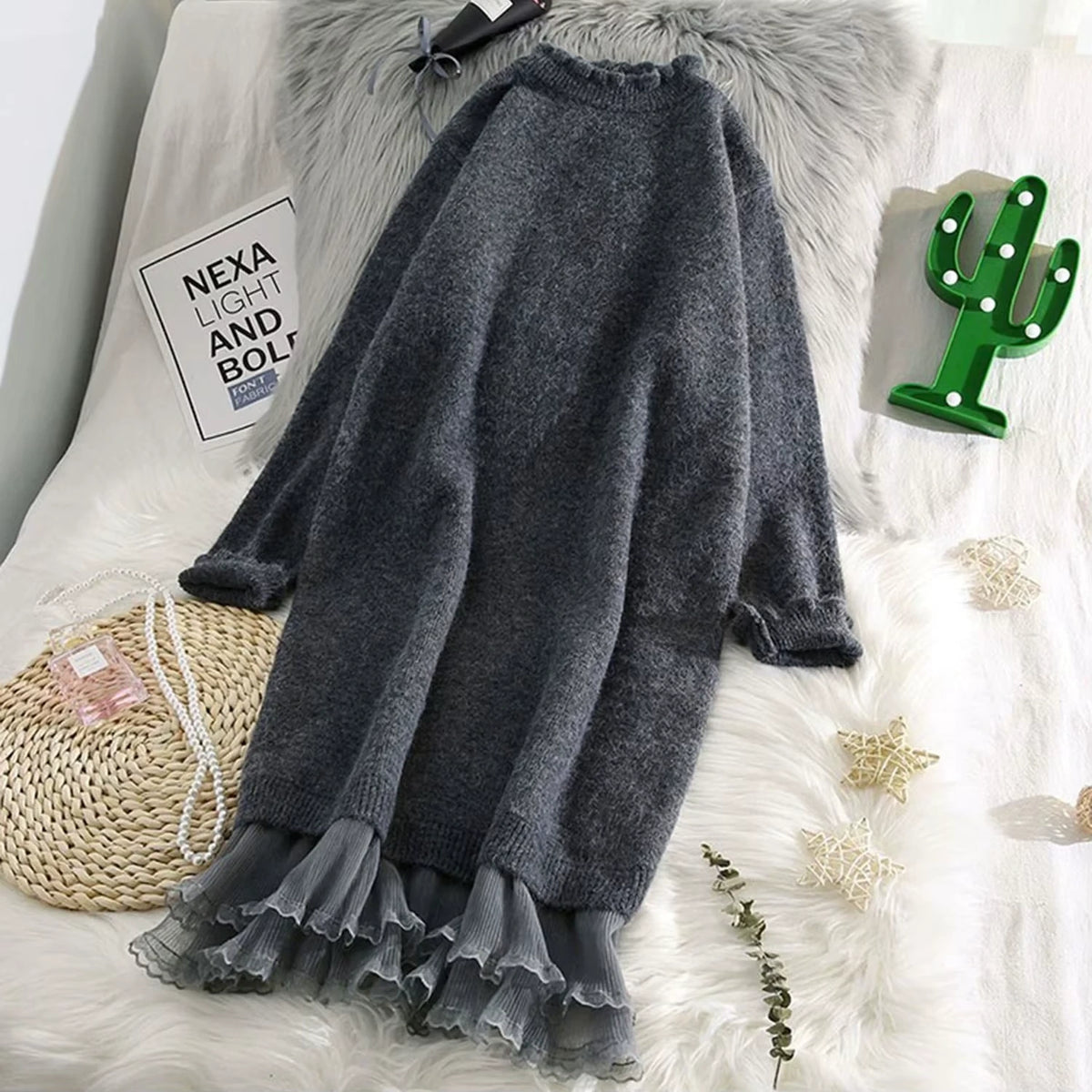 Grey women's lace trim half high collar midi jumper dress with ruffled hem, displayed on a bed — view 4