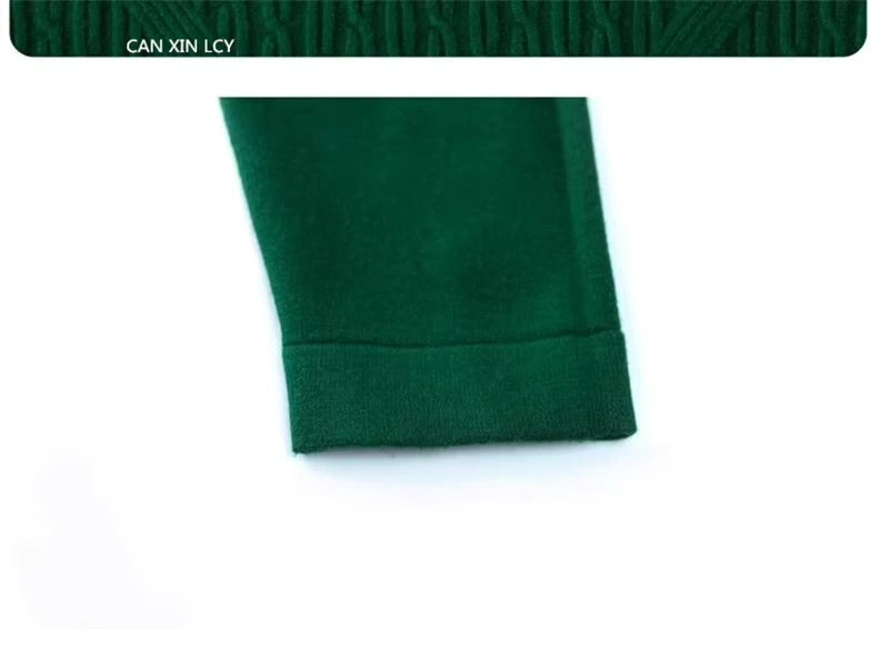 Green fabric close up of women's loose fit A line midi jumper dress sleeve — view 33 — view 36
