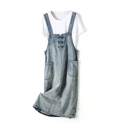 Women's loose fit denim knee length midi jumper dress with pockets, displayed on a white background — view 23 — view 24
