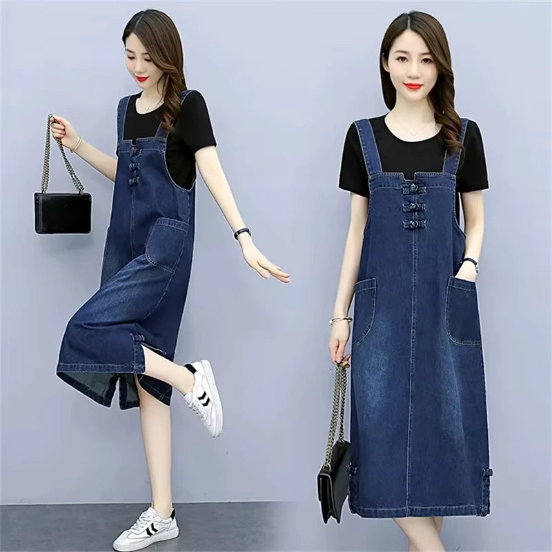 Women's loose fit denim knee length midi jumper dress with front pockets, shown in casual setting — view 4 — view 5