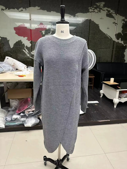 Gray knitted midi jumper dress with an O neck design on a mannequin in indoor setting — view 10 — view 13