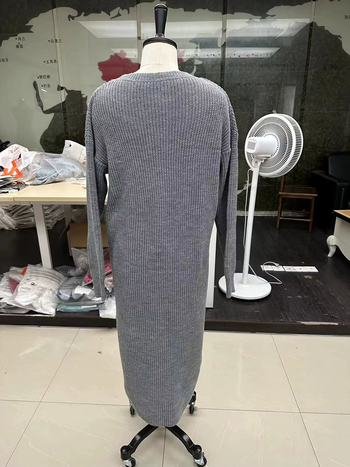 Gray knitted midi jumper dress on mannequin, showcasing a loose fit design with an O neck style — view 11 — view 14