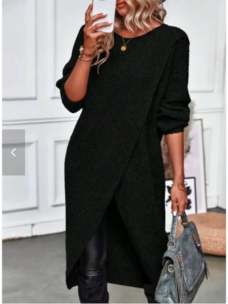 Woman in a black knitted midi jumper dress holding phone and bag indoors — view 2 — view 5