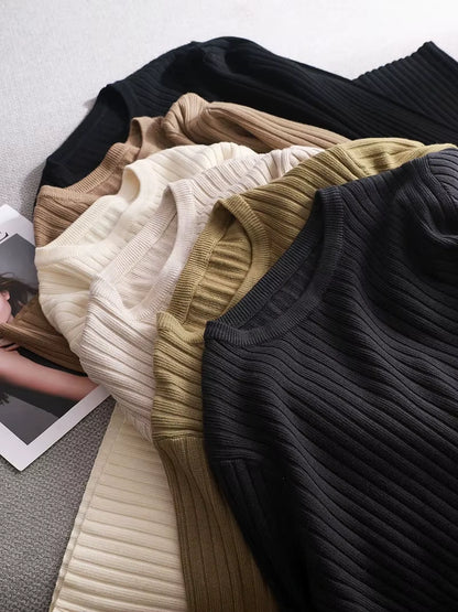 Ribbed knit midi jumper dress in assorted neutral tones, displayed folded on a surface — view 14 — view 19