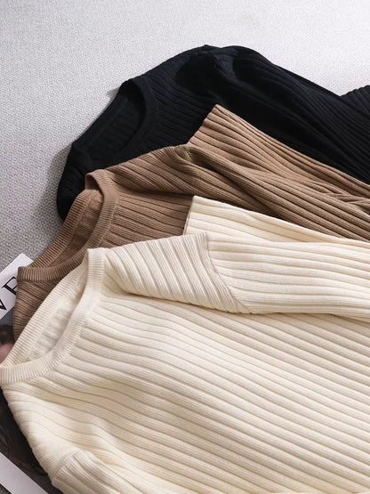 Midi jumper dress — Cream, brown, and black ribbed knit dresses in a cotton blend fabric, folded — view 16 — view 21