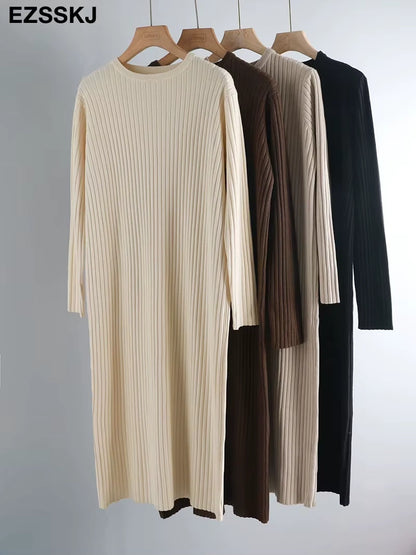 Midi jumper dress — Cream, brown, and black knit dresses on hangers, showcasing ribbed texture — view 6