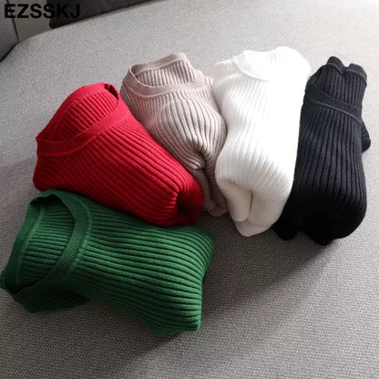 Midi jumper dress — Five folded knit dresses in red, green, beige, white, and black on a grey surface — view 6 — view 11