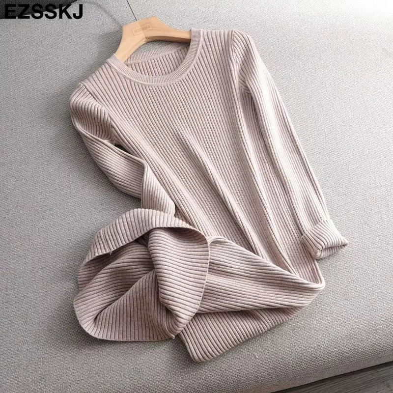 Beige knit midi jumper dress with ribbed texture, displayed on a hanger — view 25 — view 30