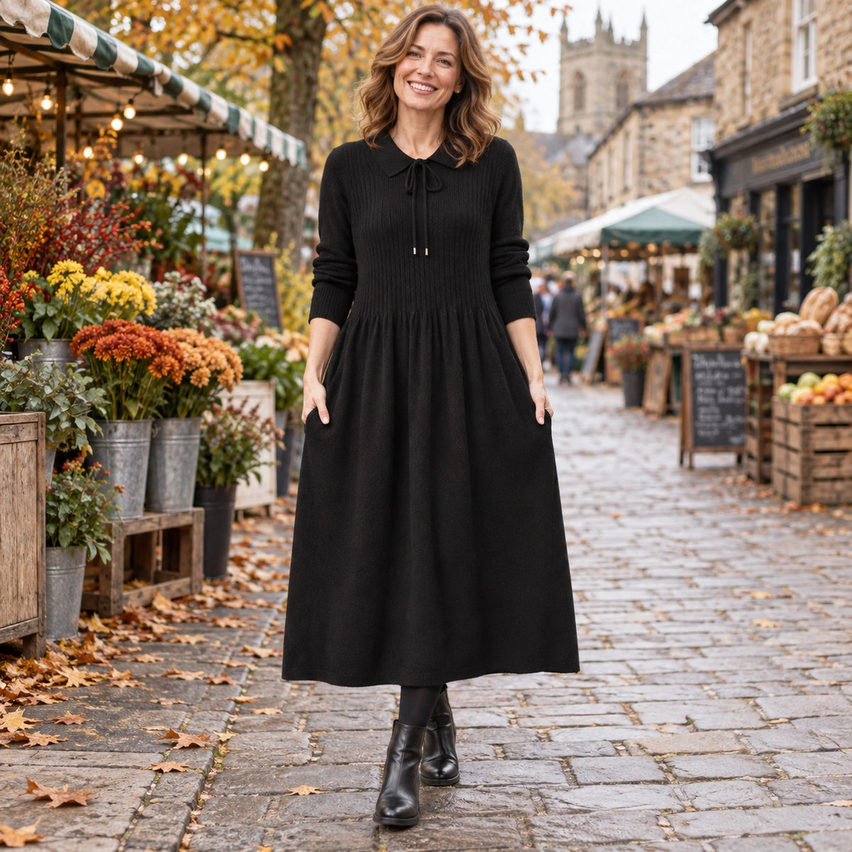 Women's Peter Pan Collar A Line Knitted Midi Jumper Dress in Black, worn by happy model UK autumn setting — view 4