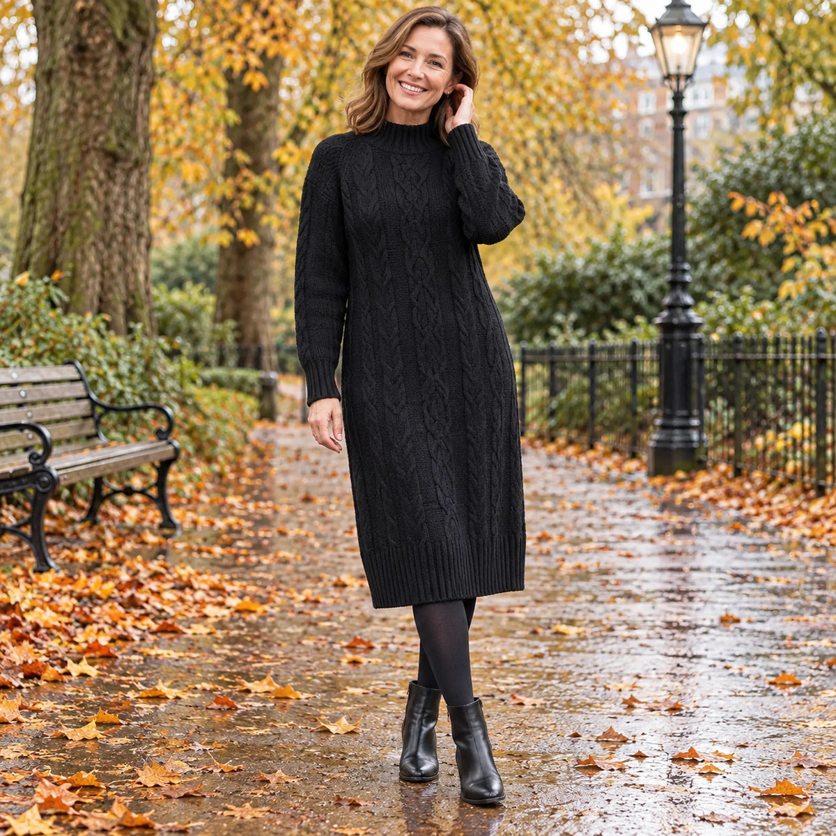 Women's Rib Knit Half High Collar Knee Length Midi Jumper Dress in Thicken Black, worn by a happy model UK autumn — view 2