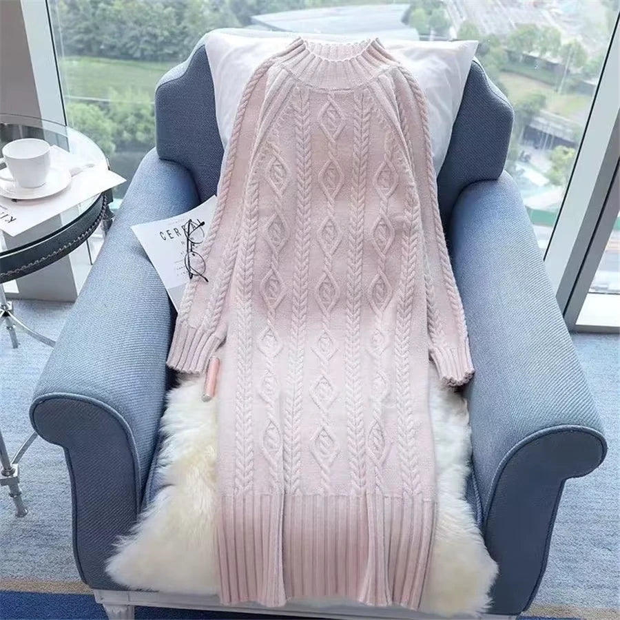 Knit knee length midi jumper dress in a soft pink hue, displayed on chair — view 25 — view 39