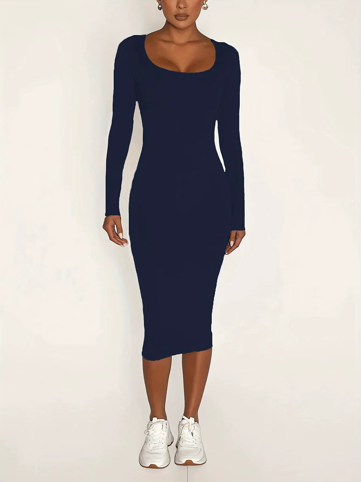 Woman wearing a navy blue square neck long sleeve midi jumper dress, front view — 9 — view 11