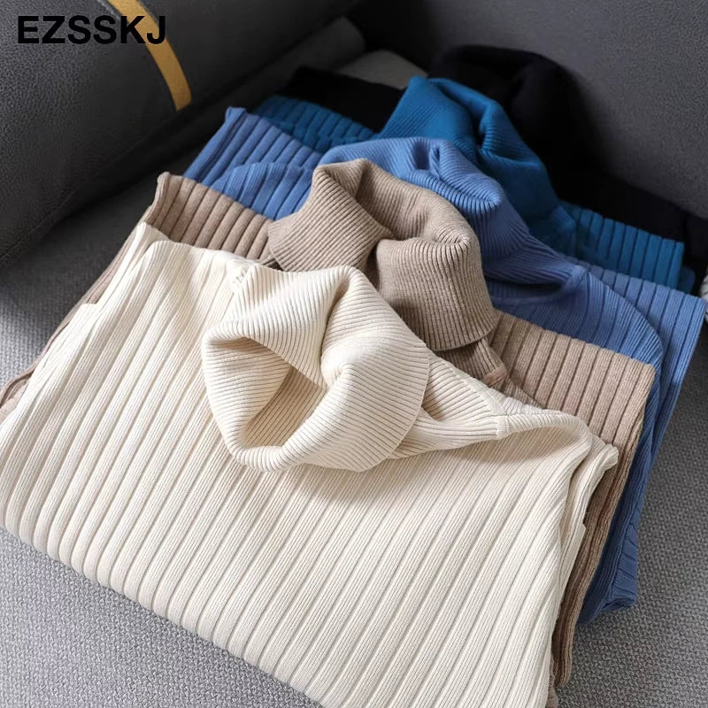 Midi jumper dress — Stack of women's turtleneck straight knit dresses in various colours, folded neatly — view 17 — view 22