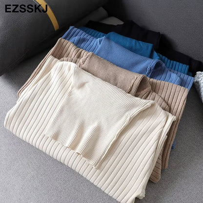Midi jumper dress — Folded women's turtleneck dresses in beige, blue, and brown, displayed on a sofa — view 18 — view 23
